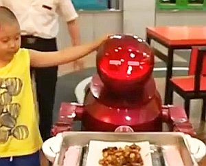 Automatischer Servierer - China liebt Roboter-Restaurants